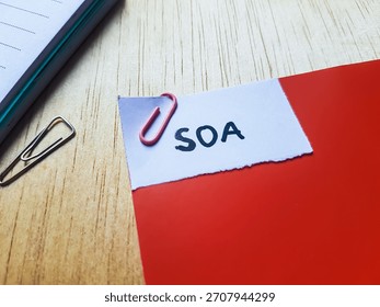 SOA writting on table background. 