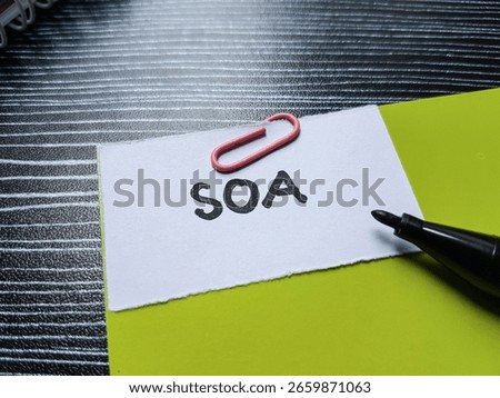 SOA writting on table background.