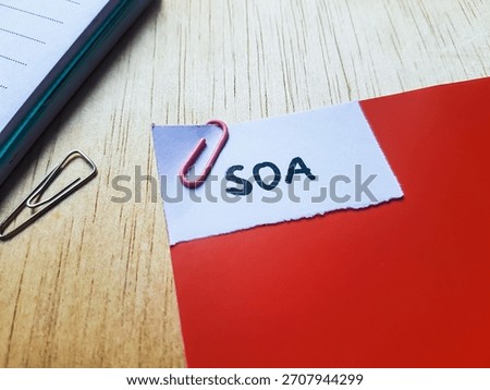 SOA writting on table background. 