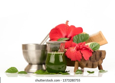 Soak Hair With Hibiscus Flower And Green Leaves Have Property Medicine.(extract From Green Leaves)