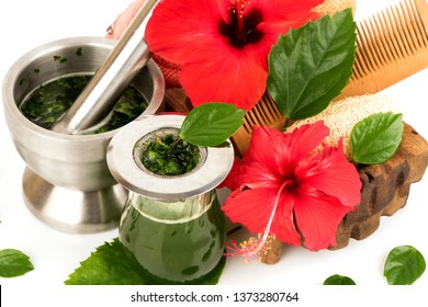 Soak Hair With Hibiscus Flower And Green Leaves Have Property Medicine.(extract From Green Leaves)