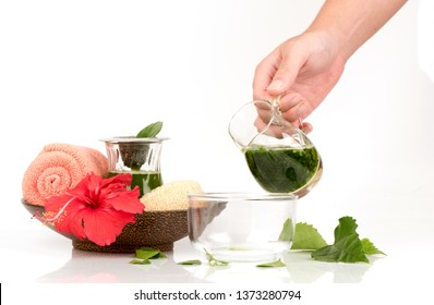 Soak Hair With Hibiscus Flower And Green Leaves Have Property Medicine.(extract From Green Leaves)