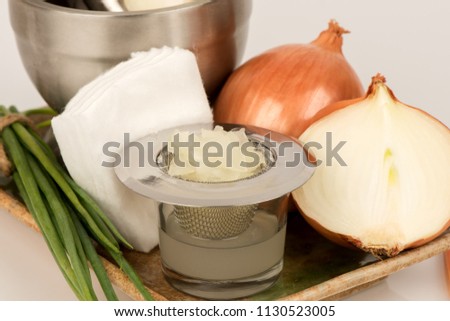 Soak hair with Onion and Cotton sheet for hair care treatment.