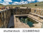 Soak or Swim in Hart Mountain Hot Springs Oregon Outback - Developed Stone And Concrete Pool With Ladder, Bench - Oregon Outback Sagebrush Desert Landscape Background - Natural Healing Waters