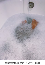 soaking feet in the bath