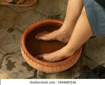 Soaking Feet Into Warm Water Before Foot  Massage.