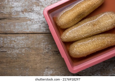 Soaking Gourd Luffa Or Loofah Fruit Or Sponge Gourd In A Solution Of Water And Bleach To Get Rid Of Fungal And Bacteria, Natural Scrubber Product, Taken From Above With Copy Space