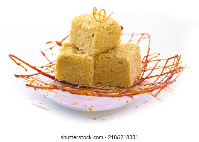 Soan Papdi Is Indian Sweet Made Of Besan.
Its Very Delicate And Tasty .
Consumed During All Happy Moments Of Light.
Made With Great Skill And Time