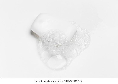 Soap Bar And Foam On White Background, Top View. Mockup For Design