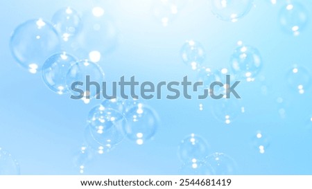 Soap Bubbles Floating in Blue Sky. Bright Sunshine During The Day. Freshness Soap Suds Bubbles Water. Abstract Blue Textured Background.