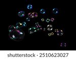 Soap bubbles isolated on a black background. Copy space. 