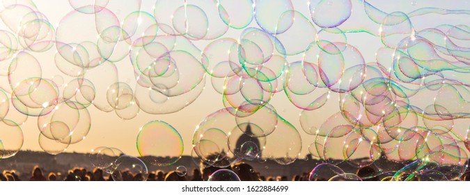 soap bubbles on the background of the sunset sky in Rome. selective focus 