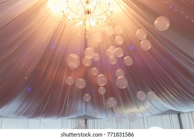 Soap bubbles on background of tent wedding.