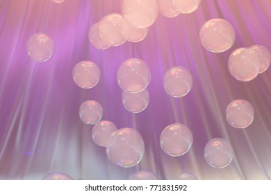 Soap bubbles on background of tent wedding.