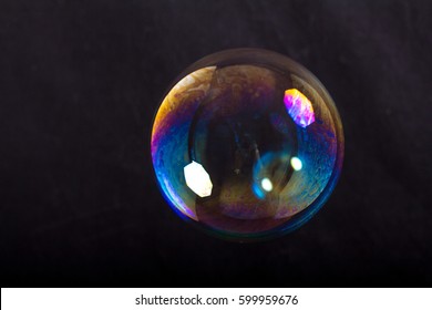 Soap Bubbles On A Black Background