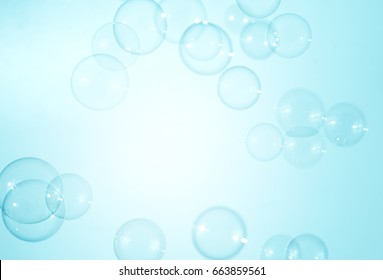 Soap bubbles on natural a blue background