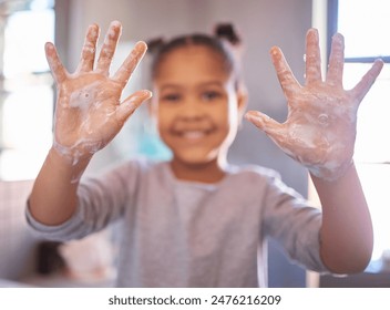 Soap, child and girl washing hands in bathroom with foam for hygiene, cleaning or prevent germ. Safety, handwashing and young kid with palms for bacteria, virus protection or morning routine in home - Powered by Shutterstock