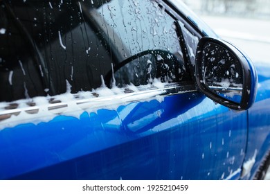 Soap Foam Drips Down The Glass. Self-service Car Wash