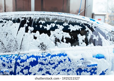 Soap Foam Drips Down The Glass. Self-service Car Wash