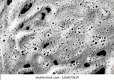 Soap Foam, Lather Isolated On Black, With Clipping Path, Texture And Background, Top View