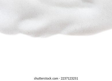 Soap foam texture on a white background with an empty place for an inscription