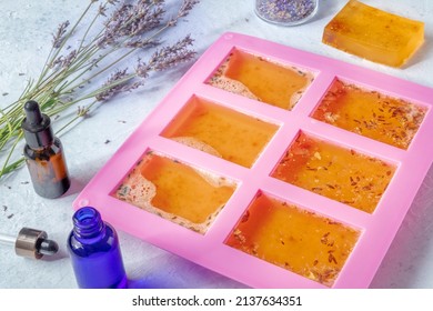 Soap Making. Liquid Glycerin With Natural Additives In A Silicone Mould, With Essential Oils And Lavender Flowers. Homemade Diy Cosmetics