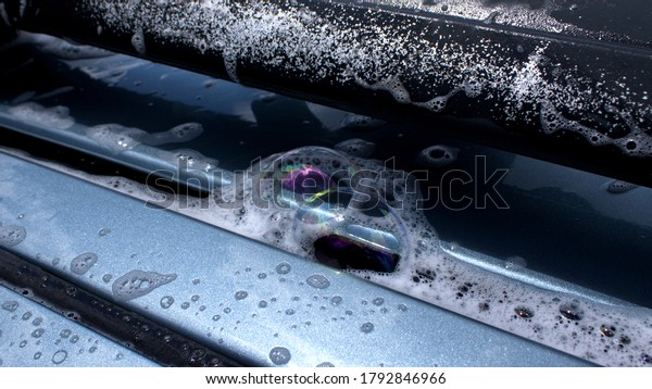 Soap Suds on a\
Vehicle