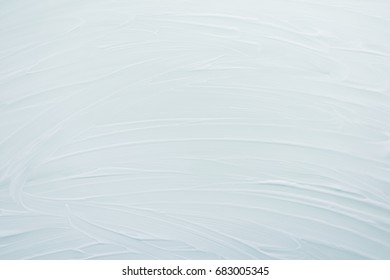 Soaped surface. Abstract simple background, backdrop  the subject of cleaning. White, light shades. Top view. Close-up. Stock photo 