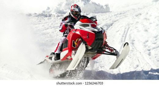 Soaring In The Snowmobile Race