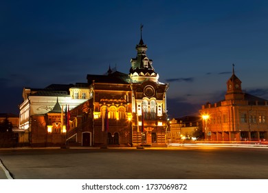 Sobornaya square with the building of the former city Duma, an architectural monument of the early 20th century and the new building of Sberbank at night. Vladimir, Russia