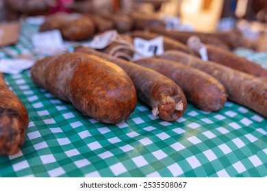 Sobrasada , traditional Menorcan sausage made of raw cured minced pork, paprika and spices in a market - Powered by Shutterstock