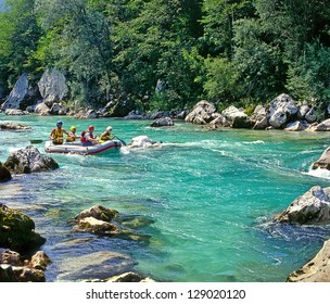 SOCA RIVER, SLOVENIA - JULY 8: White water rafting on the rapids of river Soca on July 8, 1998 in Triglav national park, Slovenia. Soca is one of the most beautiful rivers of Europe.