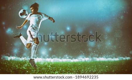 Soccer action scene with a footballer in white uniform performing a heel ball stop