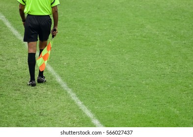 Soccer Assistant Referee Running Along Side Line