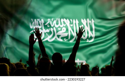 soccer background football supporters and Saudi Arabia flag - Shutterstock ID 2230193227