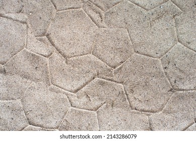 A Soccer Ball With Classical Pentagon Texture Imprinted On The Beach Sand