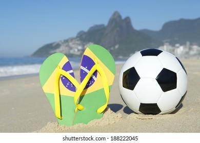 Soccer Ball Football With Brazil Flag Flip Flops On Ipanema Beach Rio De Janeiro Brazil