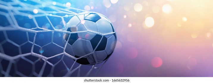 Soccer Ball in Goal on Multicolor Background - Shutterstock ID 1665632956
