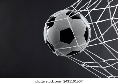 Soccer ball goal success on black background - Powered by Shutterstock