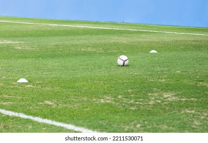Soccer Ball On The Field. Mockup