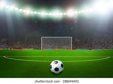 Soccer ball on the field of stadium with light 
