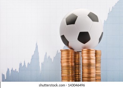 Soccer ball on a financial report background - Powered by Shutterstock