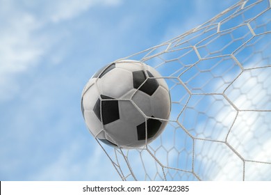 Soccer Ball On Goal With Net And Sky Background, This Photo Can Use For Football, Sport, Goal, Score, Shoot And Target Of Business Concept