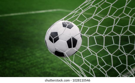 Soccer Ball On Goal With Net And Green Background, This Photo Can Use For Football, Sport, Goal, Score, Shoot And Target Of Business Concept