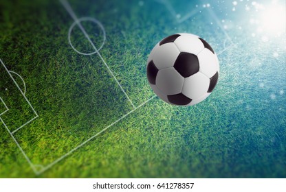 Soccer ball on green stadium with white layout. Bright spotlight illuminates soccer field. Collage made like photo taken with shallow depth of field. - Powered by Shutterstock