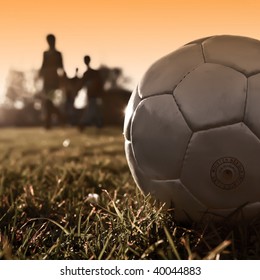 Soccer ball with people silhouette background 06