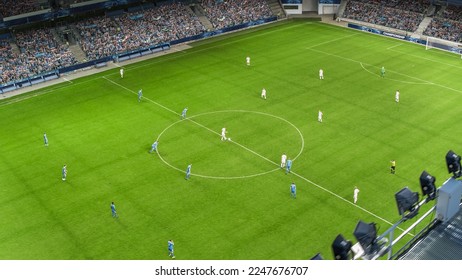 Soccer Championship Match on a Stadium full of Cheering Fans. Teams Play on Major League Football Tournament, Cup Broadcast. Sport Channel Television, Screen Content Concept. Aerial Drone Shot. - Shutterstock ID 2247676707