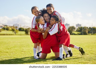 Soccer children, winner or happy for success, goal or wellness in match, game or fitness with smile on football field. Motivation, sport or kids celebrating in training, workout for teamwork exercise - Powered by Shutterstock