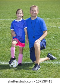 Soccer Coach And Soccer Player Portrait