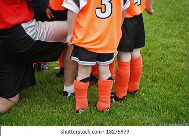 Soccer Coach With Team